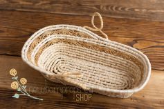 Hand woven basket with a flowery embellishment